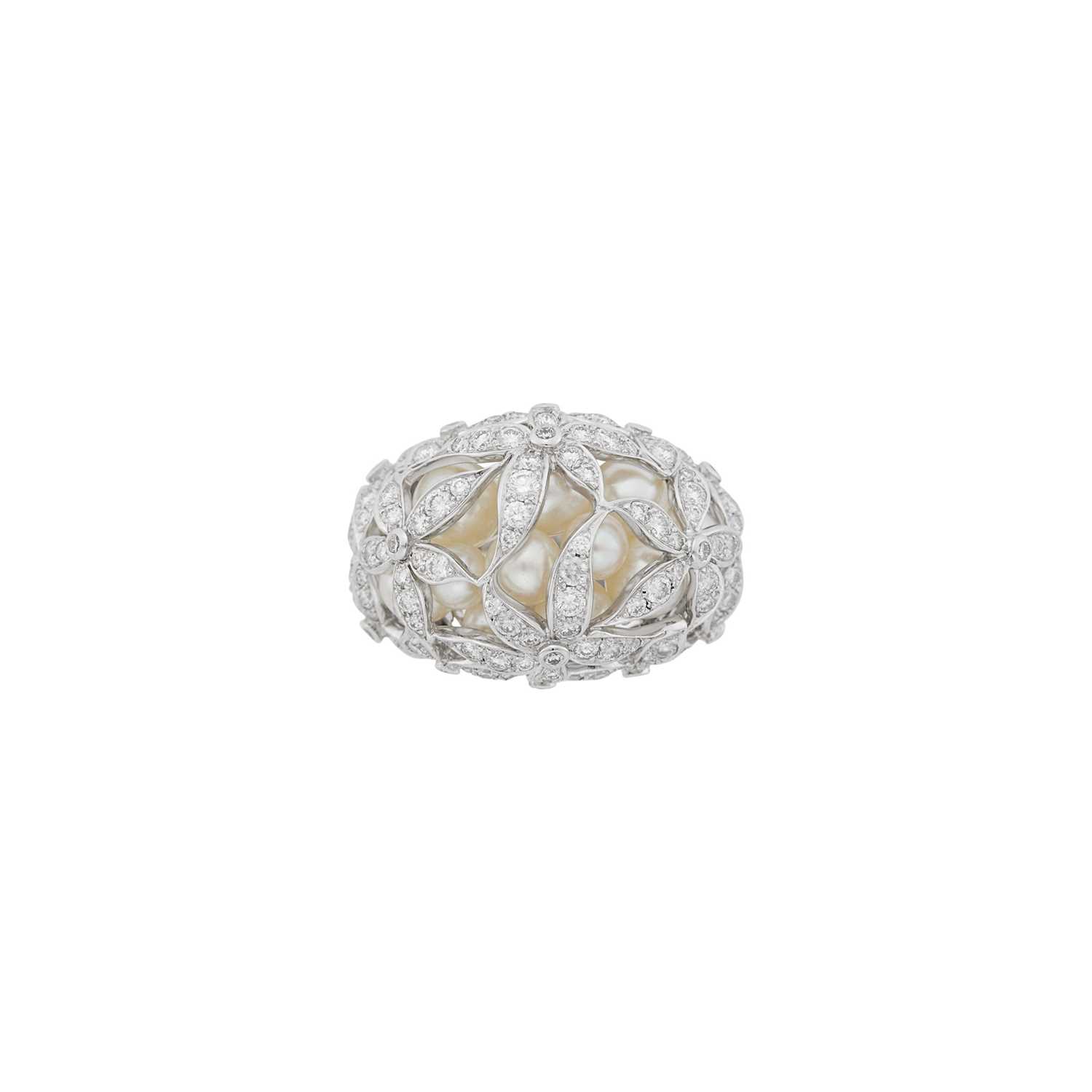 Lot 70 - Mikimoto White Gold, Cultured Pearl and Diamond Flower Bombé Ring, France