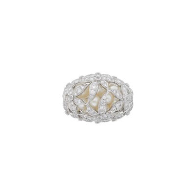 Lot 70 - Mikimoto White Gold, Cultured Pearl and Diamond Flower Bombé Ring, France