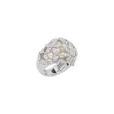 Lot 70 - Mikimoto White Gold, Cultured Pearl and Diamond Flower Bombé Ring, France