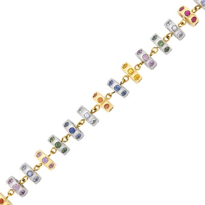 Lot 52 - Two-Color Gold, Multicolored Sapphire and Ruby Circle Link Bracelet
