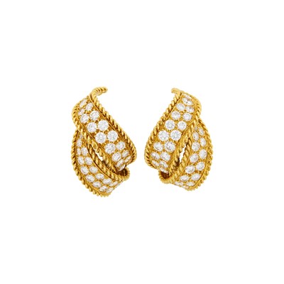 Lot 125 - Sterlé Pair of Gold and Diamond Bombé Ribbon Earrings