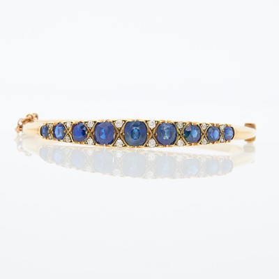 Lot 1039 - Gold, Sapphire and Diamond Bangle Bracelet