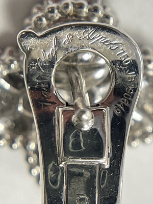 Lot 68 - Van Cleef & Arpels Pair of White Gold and Diamond 'Magic Alhambra' Pendant-Earrings, France