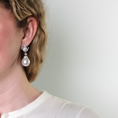 Lot 158 - Pair of Platinum, Diamond and South Sea Cultured Pearl Pendant-Earrings, France