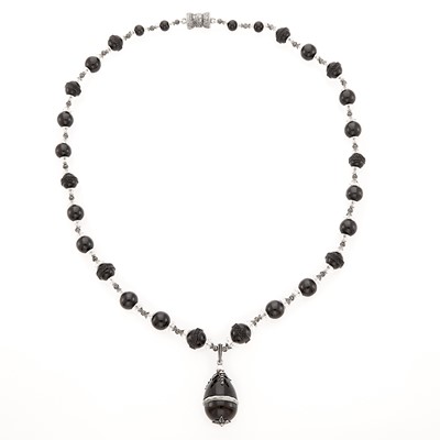 Lot 1185 - Rhodium Plated Silver, Diamond, Jet, Rock Crystal, Black Agate and Pearl Pendant-Necklace