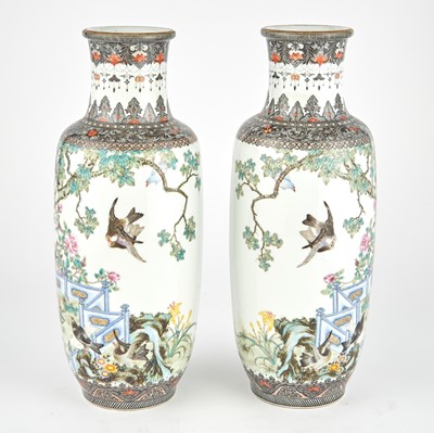 Lot 233 - A Large and Fine Pair of Chinese Enameled Porcelain Vases