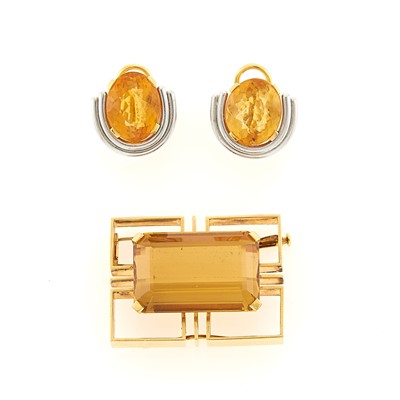 Lot 1201 - Gold and Citrine Pendant-Brooch and Pair of Two-Color Gold and Citrine Earclips