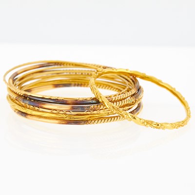 Lot 1144 - Twelve Gold Bangle Bracelets