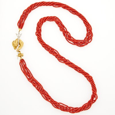 Lot 1028 - Long Seven Strand Coral Bead Torsade Necklace with Two-Color Gold and Diamond Sea Serpent Clasp