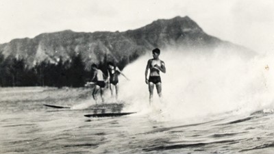 Lot 31 - [HAWAII-HULA & SURFING]
An oblong souvenir photograph album with leather covers printed in color.