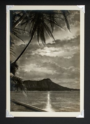 Lot 31 - [HAWAII-HULA & SURFING]
An oblong souvenir photograph album with leather covers printed in color.