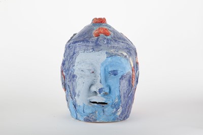 Lot 110 - A Painted Ceramic Head of Buddha