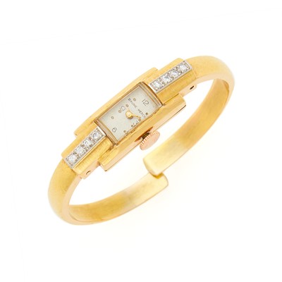 Lot 1204 - Baume & Mercier Gold and Diamond Bangle-Watch