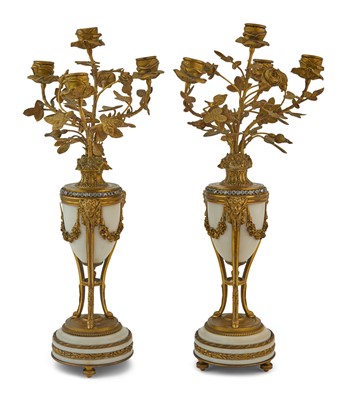 Lot 411 - Pair of Louis XVI Style Gilt-Metal and White Marble Four-Light Candelabra