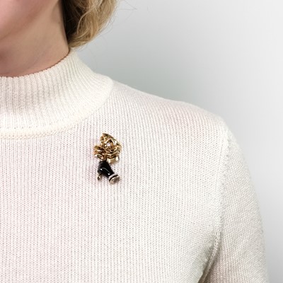 Lot 84 - Cartier Paris Gold, Platinum, Steel, Black Enamel and Diamond Clip