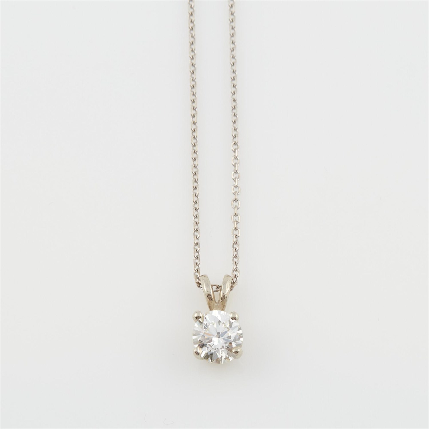 Lot 434 - Diamond Solitaire Pendant about 0.95 ct., and...