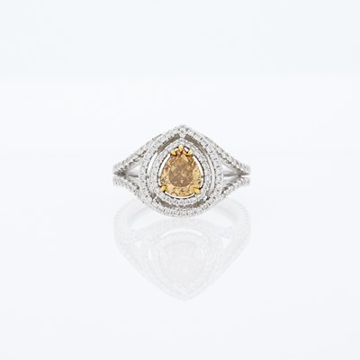 Lot 1260 - White Gold, Colored Diamond and Diamond Ring