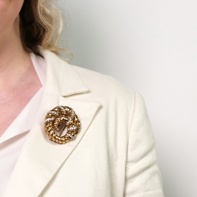 Lot 35 - David Webb Hammered Gold, Platinum and Diamond Clip-Brooch