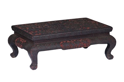 Lot 75 - A Chinese Cinnabar and Black Lacquer Low Table