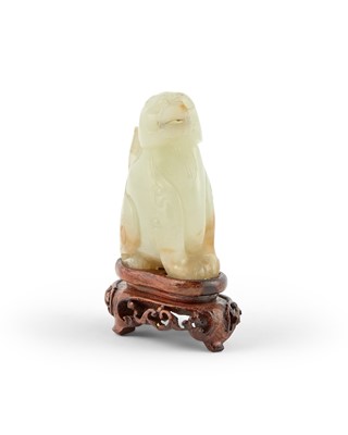Lot 35 - A Chinese White Jade Carving of a Mystical Beast