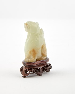 Lot 35 - A Chinese White Jade Carving of a Mystical Beast