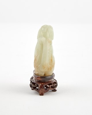 Lot 35 - A Chinese White Jade Carving of a Mystical Beast