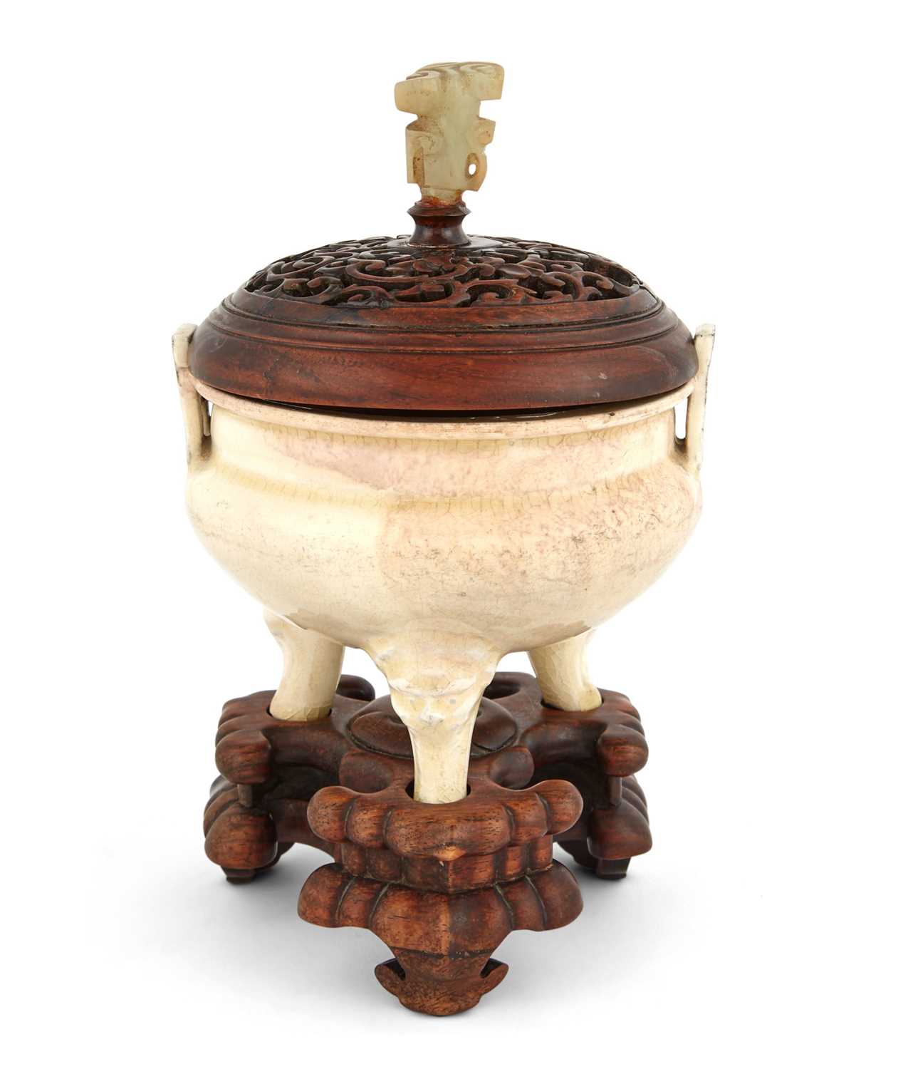 Lot 328 - A Chinese Cream Glazed Tripod Censer