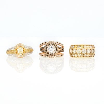 Lot 2186 - Three Tricolor Gold, Diamond and Colored Diamond Rings and Jacket