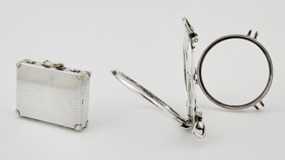 Lot 155 - Tiffany & Co. Novelty Sterling Silver Miniature Suitcase and "Porthole" Picture Frame