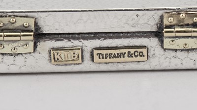 Lot 155 - Tiffany & Co. Novelty Sterling Silver Miniature Suitcase and "Porthole" Picture Frame