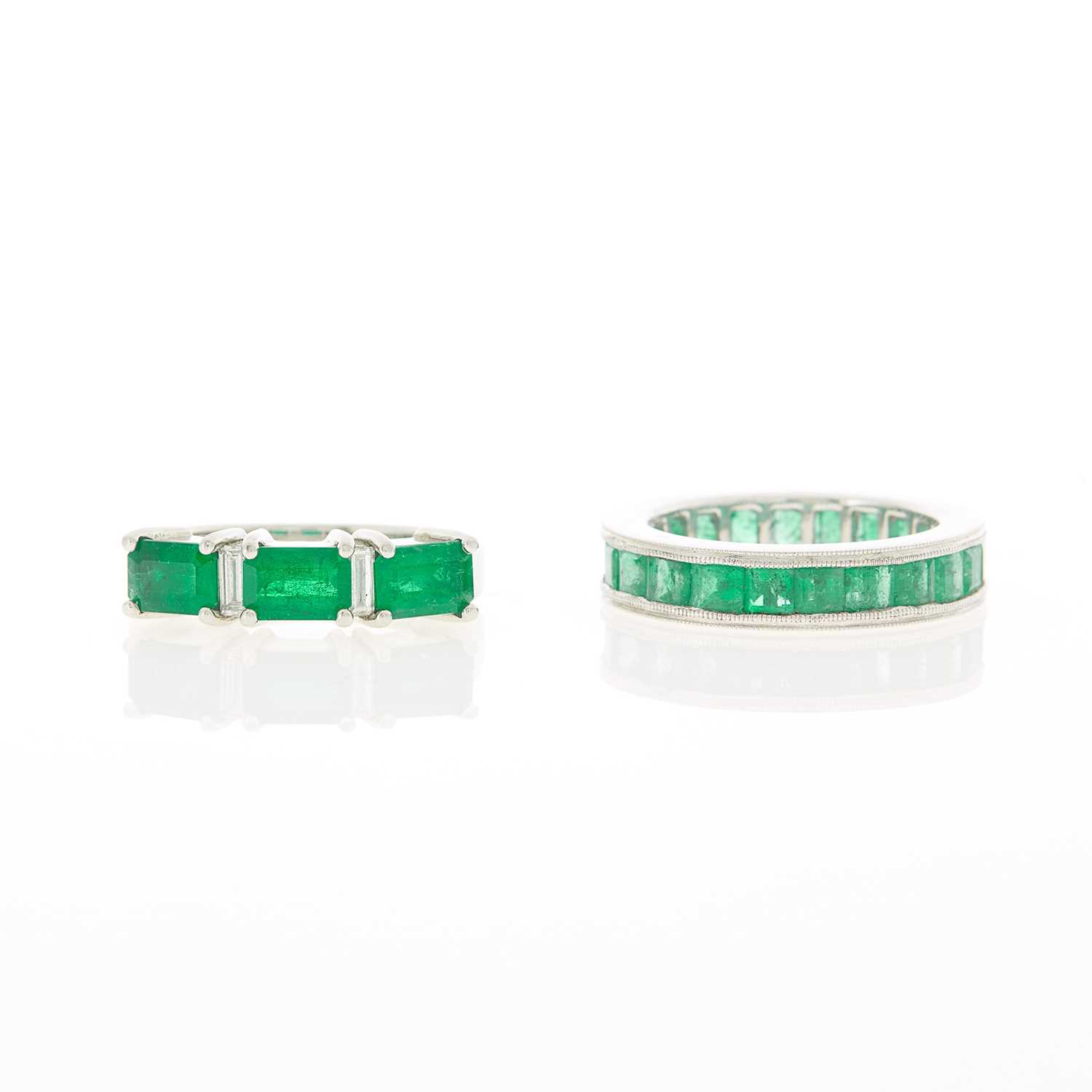 Lot 2063 - Two Platinum, White Gold, Emerald and Diamond Band Rings
