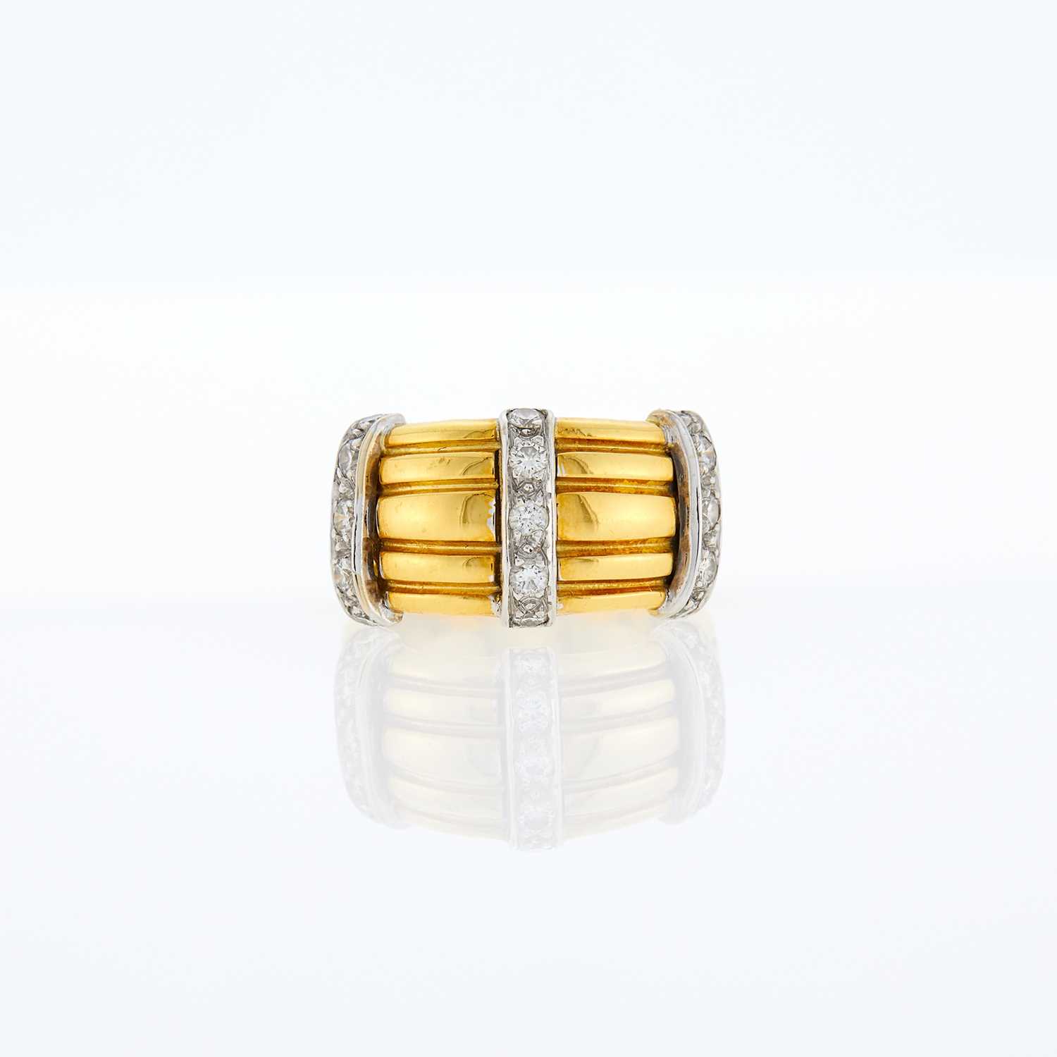 Lot 1082 - Wide Two-Color Gold and Diamond Ring