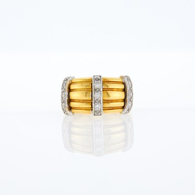 Lot 1082 - Wide Two-Color Gold and Diamond Ring