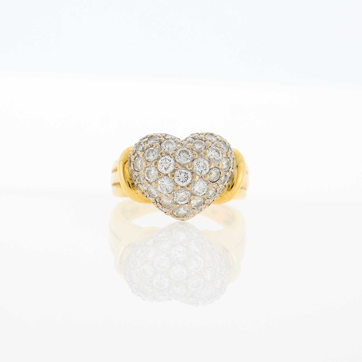 Lot 1049 - Two-Color Gold and Diamond Puffed Heart Ring