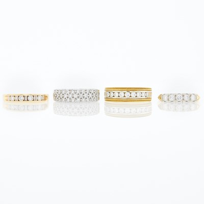 Lot 1085 - White Gold and Diamond Band Ring and Three Two-Color Gold and Diamond Band Rings
