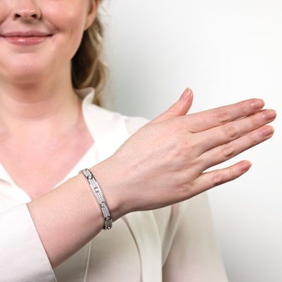 Lot 67 - Cartier White Gold and Diamond 'Love' Bangle Bracelet
