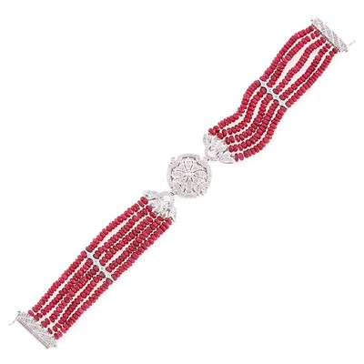 Lot 1108 - Four Strand Ruby Bead, White Gold and Diamond Bracelet