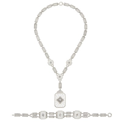 Lot 1141 - White Gold, Carved Frosted Rock Crystal and Diamond Necklace and Bracelet