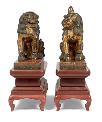 Lot 576 - An Exceptional Pair of Japanese Gilt Lacquered Wood Shi Shi on Stands