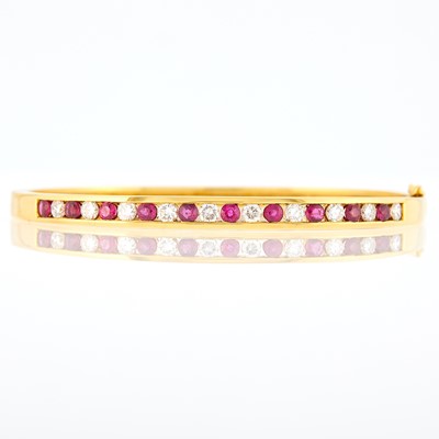 Lot 1162 - Gold, Ruby and Diamond Bangle Bracelet