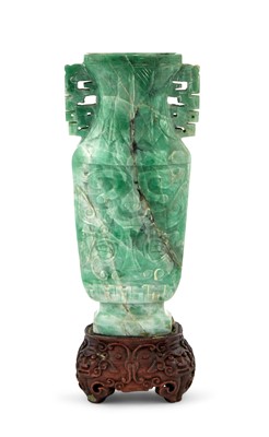 Lot 484 - A Chinese Archaistic Carved Jadeite Vase
