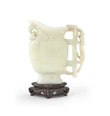 Lot 77 - A Large Chinese White Jade Pouring Vessel