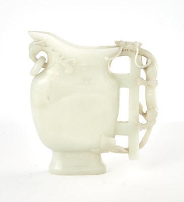 Lot 469 - A Large Chinese White Jade Pouring Vessel