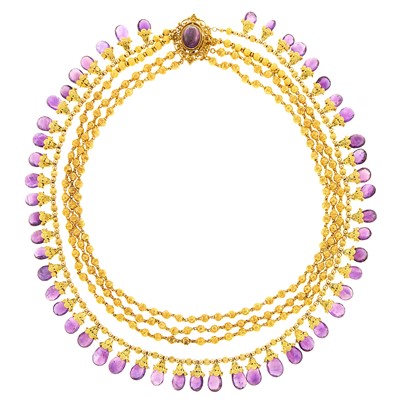 Lot 1239 - Four Strand Gold Bead and Amethyst Fringe Necklace