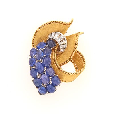 Lot 1041 - Two-Color Gold, Cabochon Sapphire and Diamond Clip-Brooch