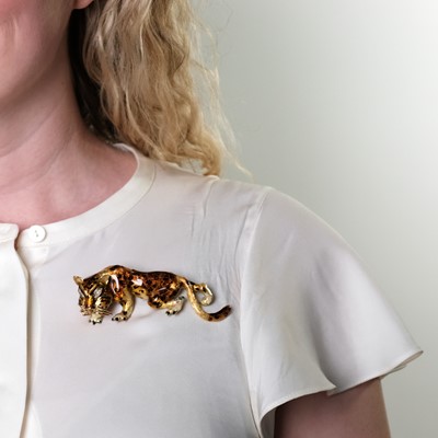 Lot 131 - Two Two-Color Gold Enamel and Diamond Lion and Panther Brooches