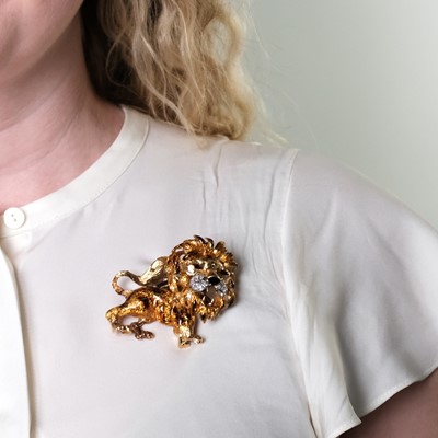 Lot 131 - Two Two-Color Gold Enamel and Diamond Lion and Panther Brooches