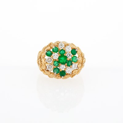 Lot 1045 - Gold, Emerald and Diamond Cluster Ring