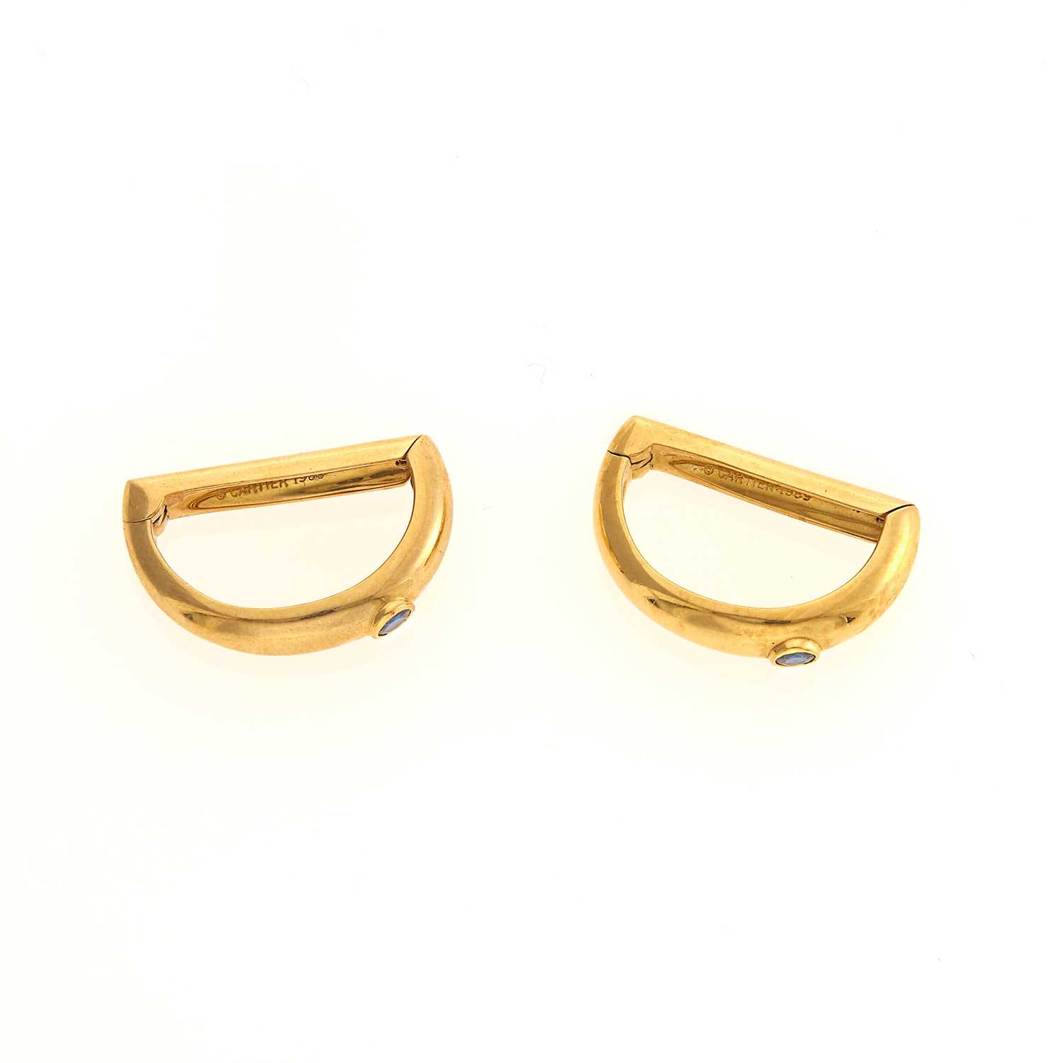 Lot 1036 - Cartier Pair of Gold and Sapphire Cufflinks
