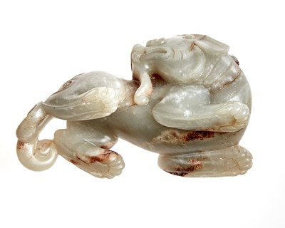 Lot 34 - A Chinese Jade Carving of a Mythical Beast